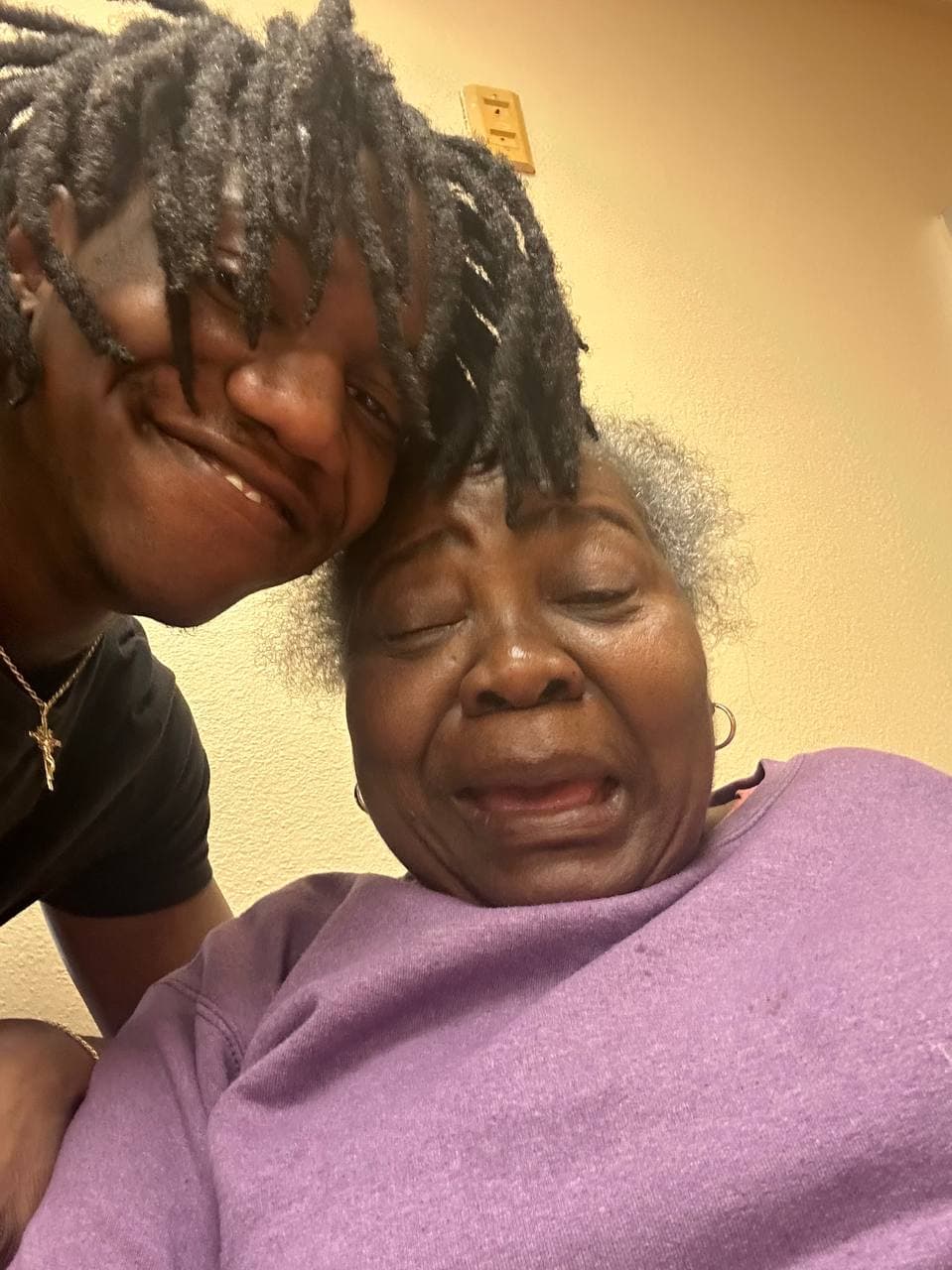 Christianne sharing a close selfie with a loved one.
